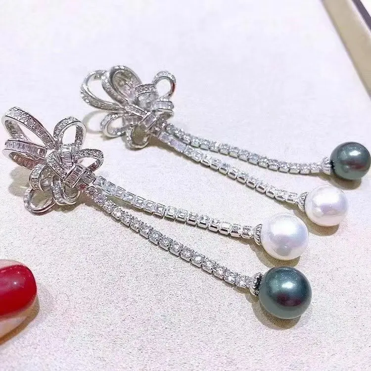 

Новый дизайн, висячие серьги с белым и черным жемчугом 925s