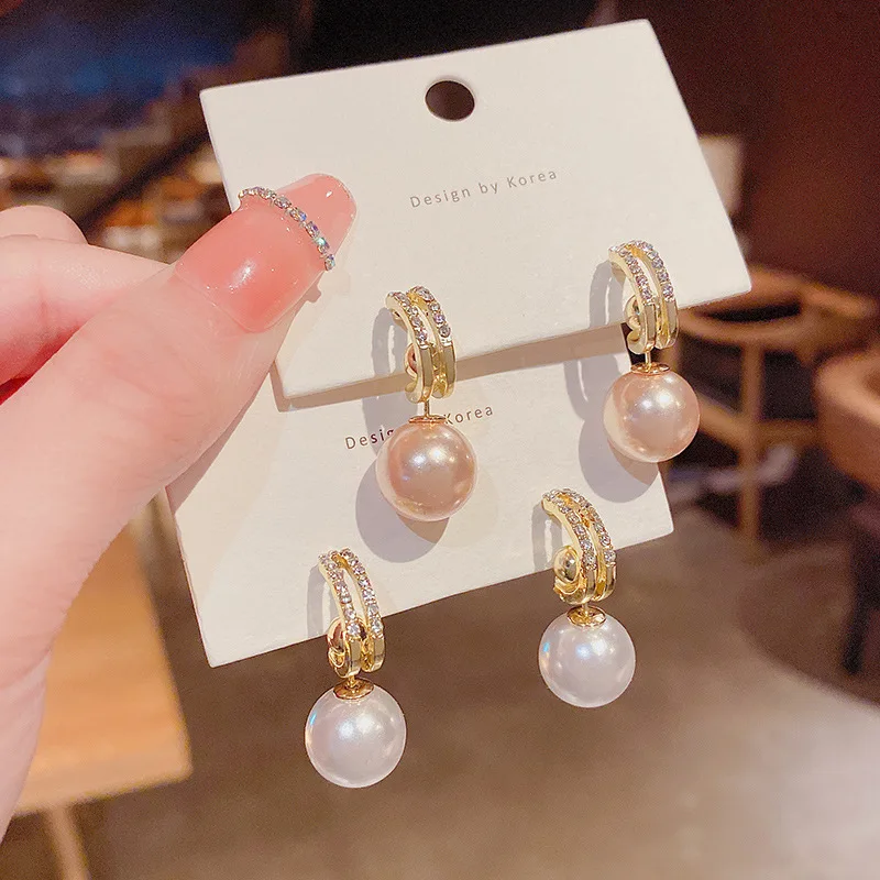 

The new Korean version pearl earrings for women wear two high-end design simple temperament earrings