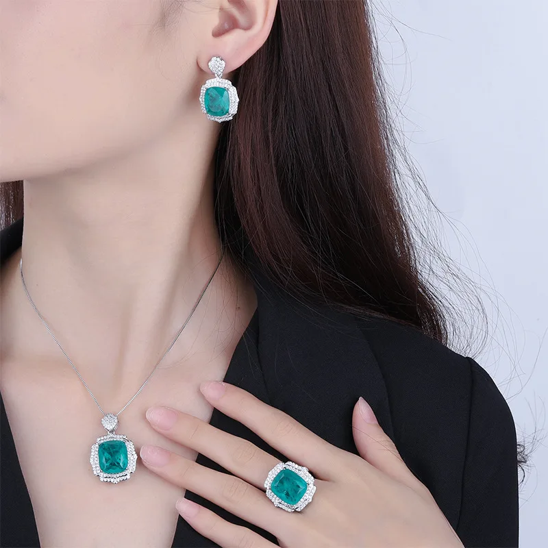 

2023 new 3-piece copper bottom gold-plated imitation grandmother green luxury set pendant 1 ring 4 * 16 earrings 12 * 14