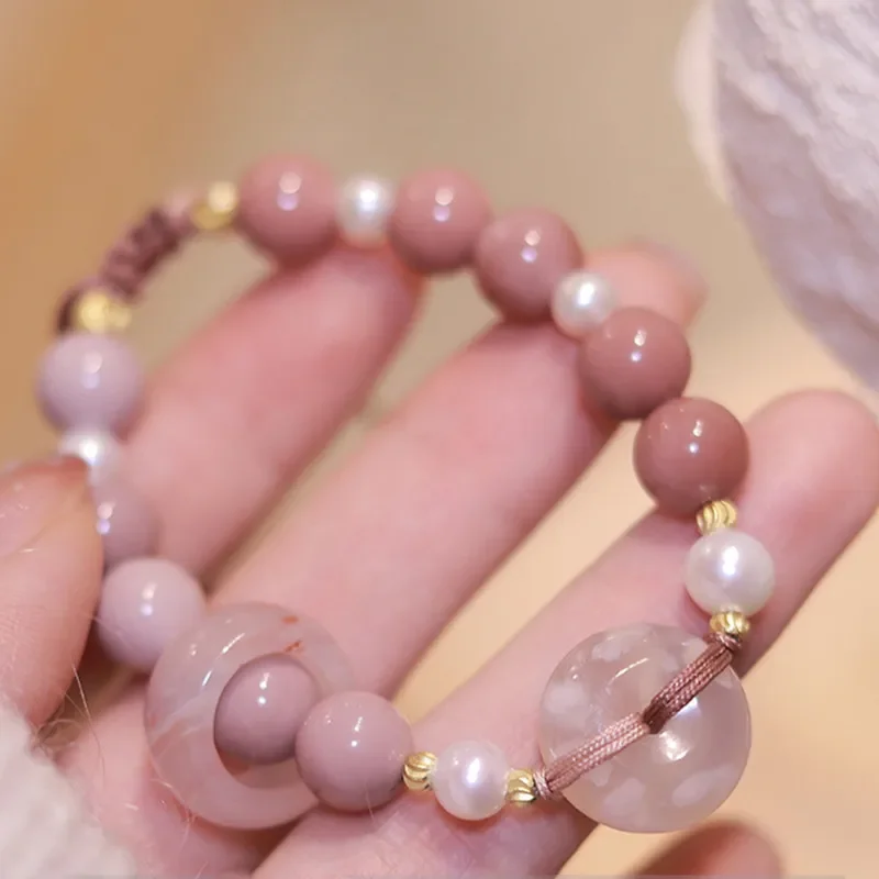 

Cherry agate 8.5mm gold pearl string hand string pink girl heart bracelet female immortal versatile bracelet wholesale bulk hot