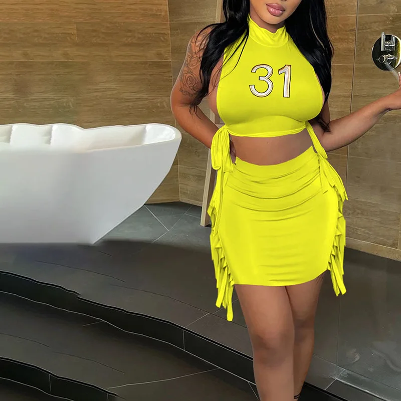 

Sexy Tassel Letter Print Two Piece Set Women Sleeveless Bandage Side Cut Out Top+Solid Skinny Skirt Lady Streetwear Outfit