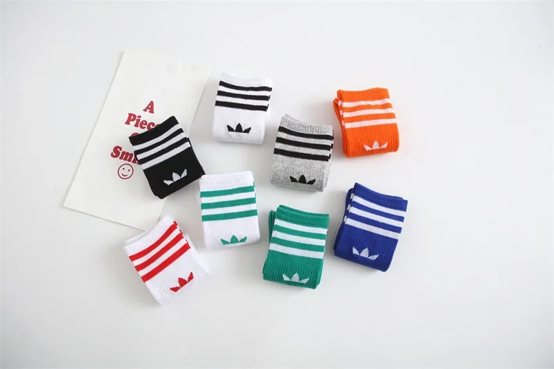 New fashion executive sports socks advertising clover men's and women's cotton socks 2023Ins tide socks striped socks