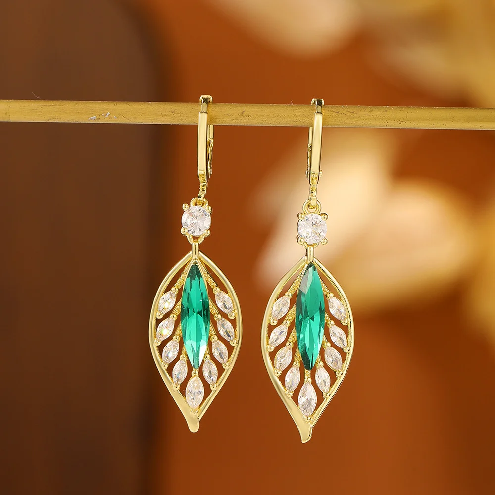 

Exquisite zircon leaves earrings gold crystal hoop earring for women hollow out geometric earring jewelry 2023