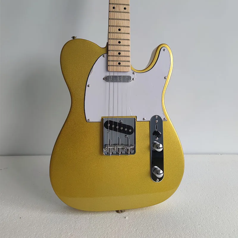 

Factory direct sales TL electric guitar peach blossom core body maple neck and fingerboard gold paint, including freight.
