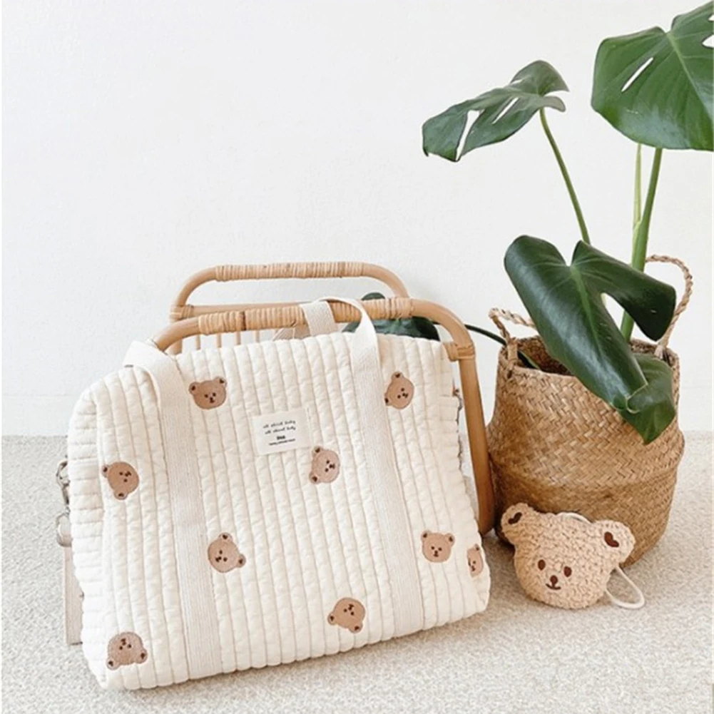 

2022 New Cute Bear Flower Embroidery Pattern Baby Beige Cotton Fabric Zipper Diaper Handbag Luggage Bag