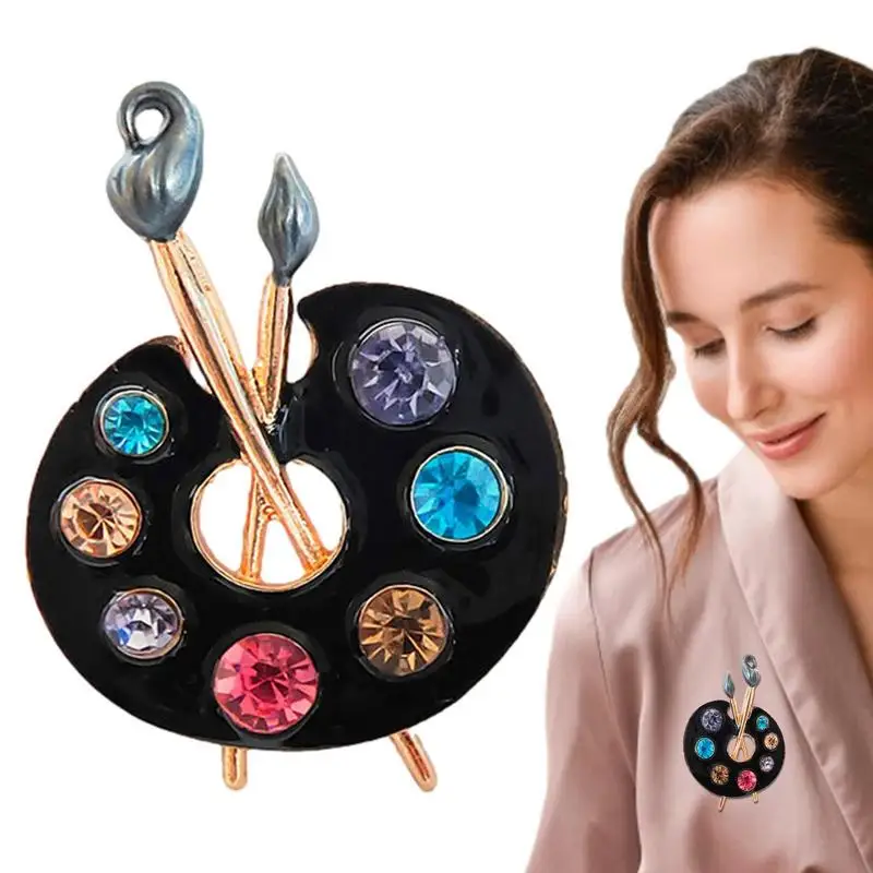 Женская эмалированная брошь в виде палетки и кисти