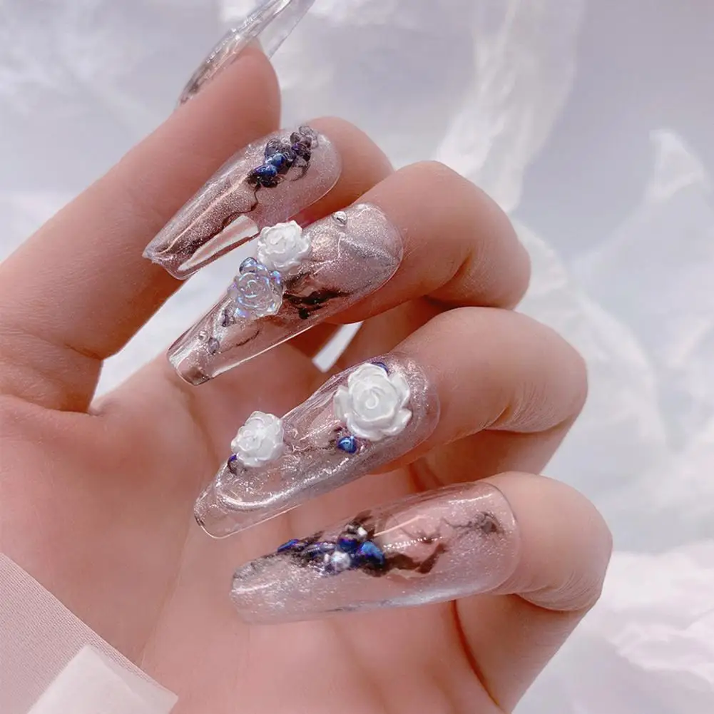 

Good Nail Charm Creative Shape Resin 6 Grids Camellia Fake Nail Charms Manicure Decor Nail Decoration Nail Jewelry 1 Box
