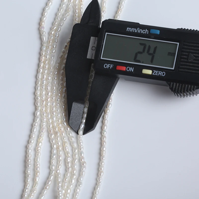 Оптовая продажа Пресноводный Жемчуг в форме белого риса 2-2 6 мм короткие нити 18 см