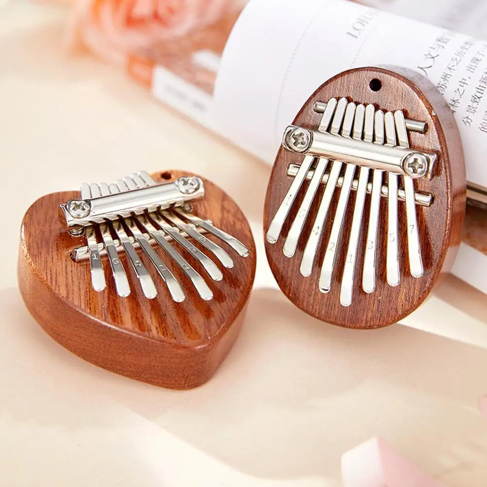 

1pc 4 style Mini thumb piano 8 tone mini kalimba crystal beginner instrument piano finger transparent finger portable piano A1V5