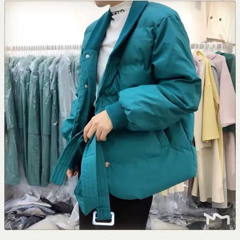 Fashionable Version of The V-neck Winter Waist Waist Waist Warmth Pure Color Wild Loose Belt Jacket Thickened Office Ladies