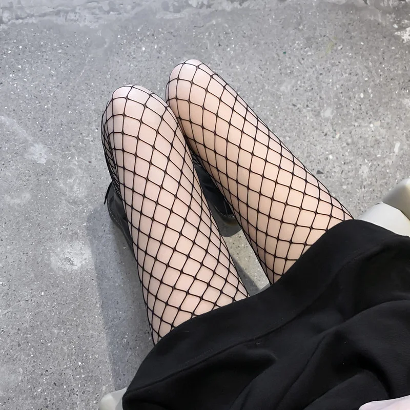 

Taobao sexy fishing net socks women's black silk stockings net red ins fashion hollowed out mesh Jumpsuit socks JK