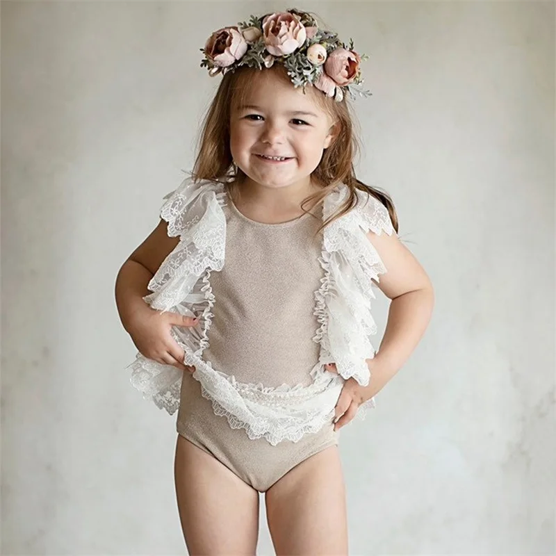 

Детский кружевной комбинезон без рукавов, с круглым вырезом и узлом