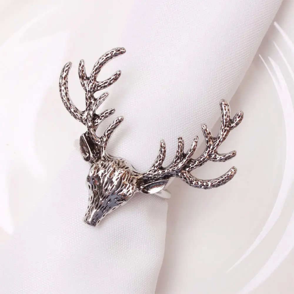 

Золотые кольца для салфеток с головой оленя