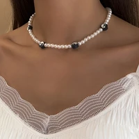 pastoral retro imitation pearl necklace simple black and white taiji soft ceramic clavicle chain