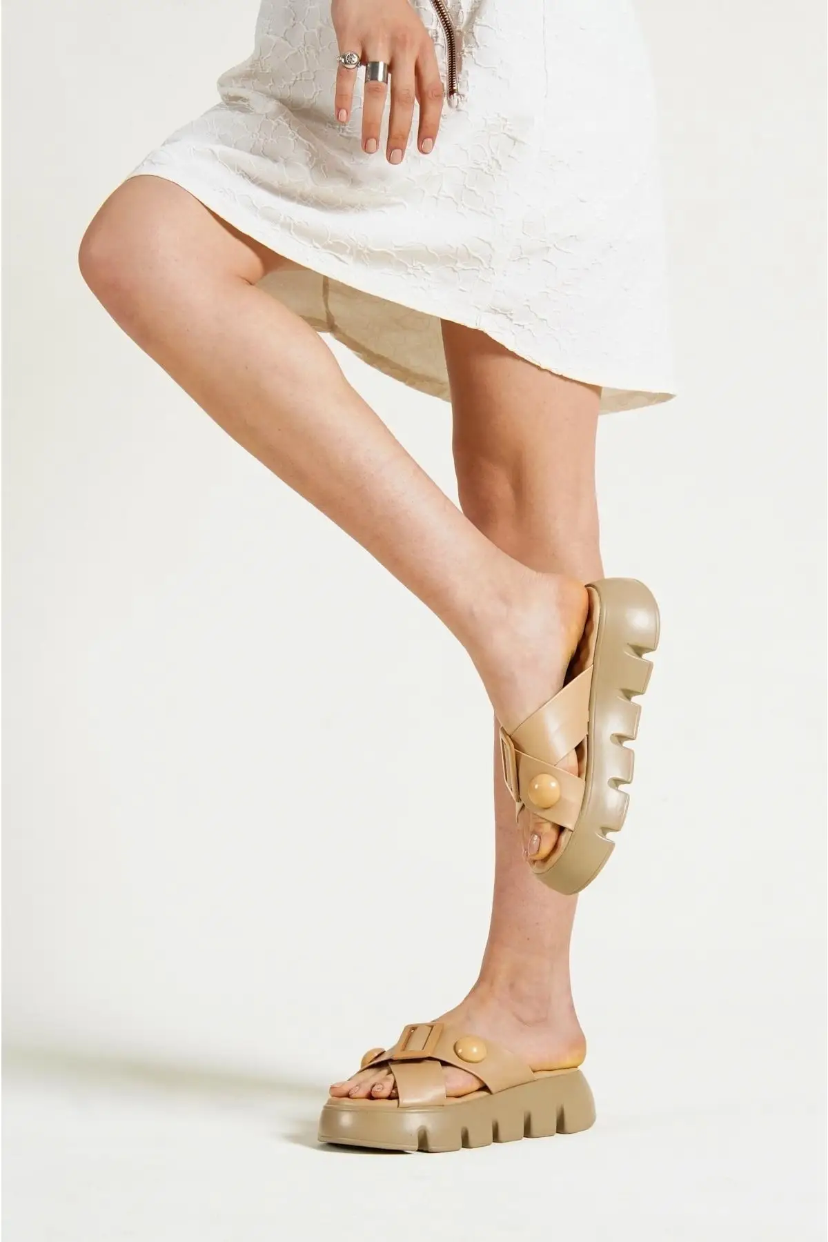 

Violet cross button detailed thick sole slippers