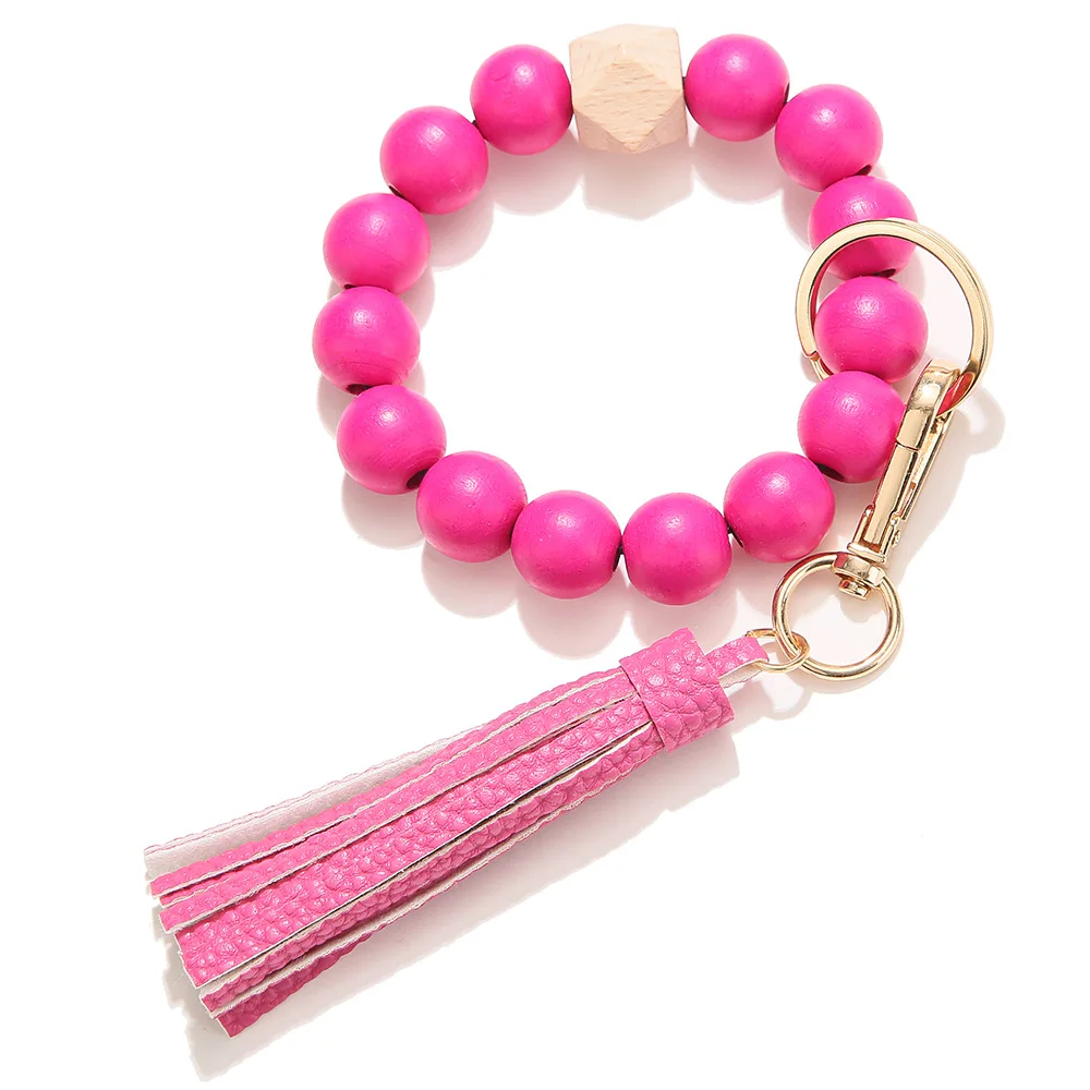 

12pcs Pink Wooden Beads Keychain Bracelet Key Pendant Keyrings Exaggerated Round Green Wood Beads Charm Key Ring with Tassel