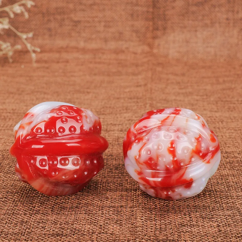 

Natural Gobi Jade Chicken Blood Jade Walnut Handle Piece Xinjiang Gold Silk Jade Popular Hand Play Piece