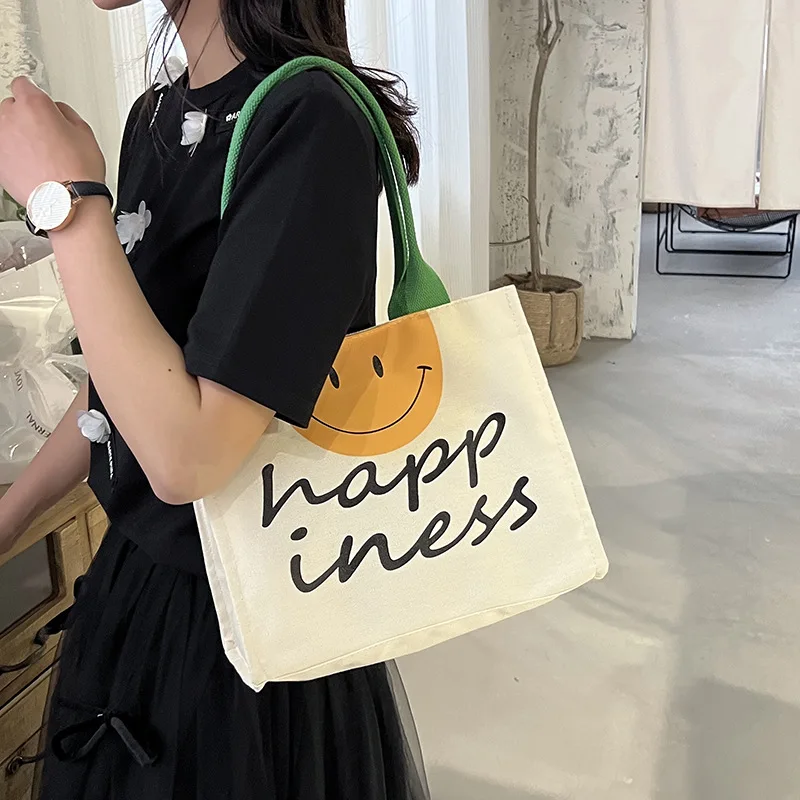 

Large Capacity Shopping Bag Women 2022 New Simple Handbags Fashion Casual Smiley Letter Canvas Bags Versatile Crossbody Tote Bag