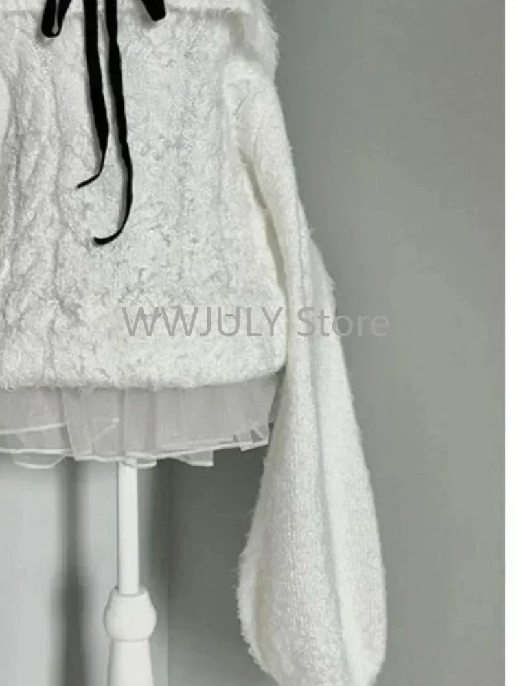 Вязаный свитер с открытыми плечами