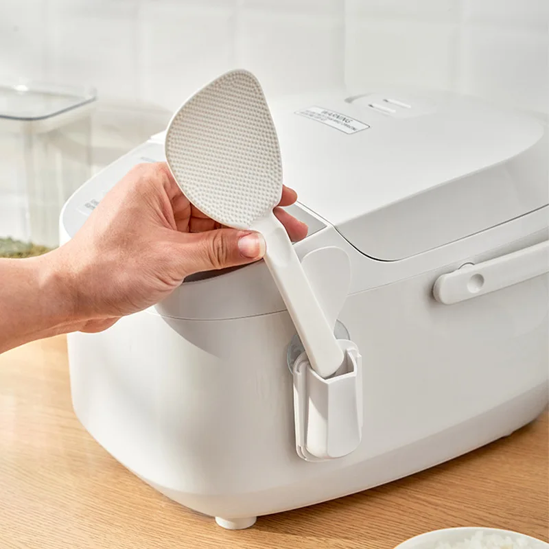 

Rice Spoon Holder Strong Suction Space Saving Punch-free Suction Up Electric Cooker Rice Shovel Storage Rack Kitchen Utensil