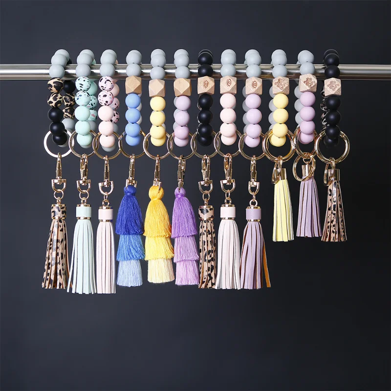 

Leather PU tassel silicone beads wrist key chain portable popular bracelet car key chain bag pendant