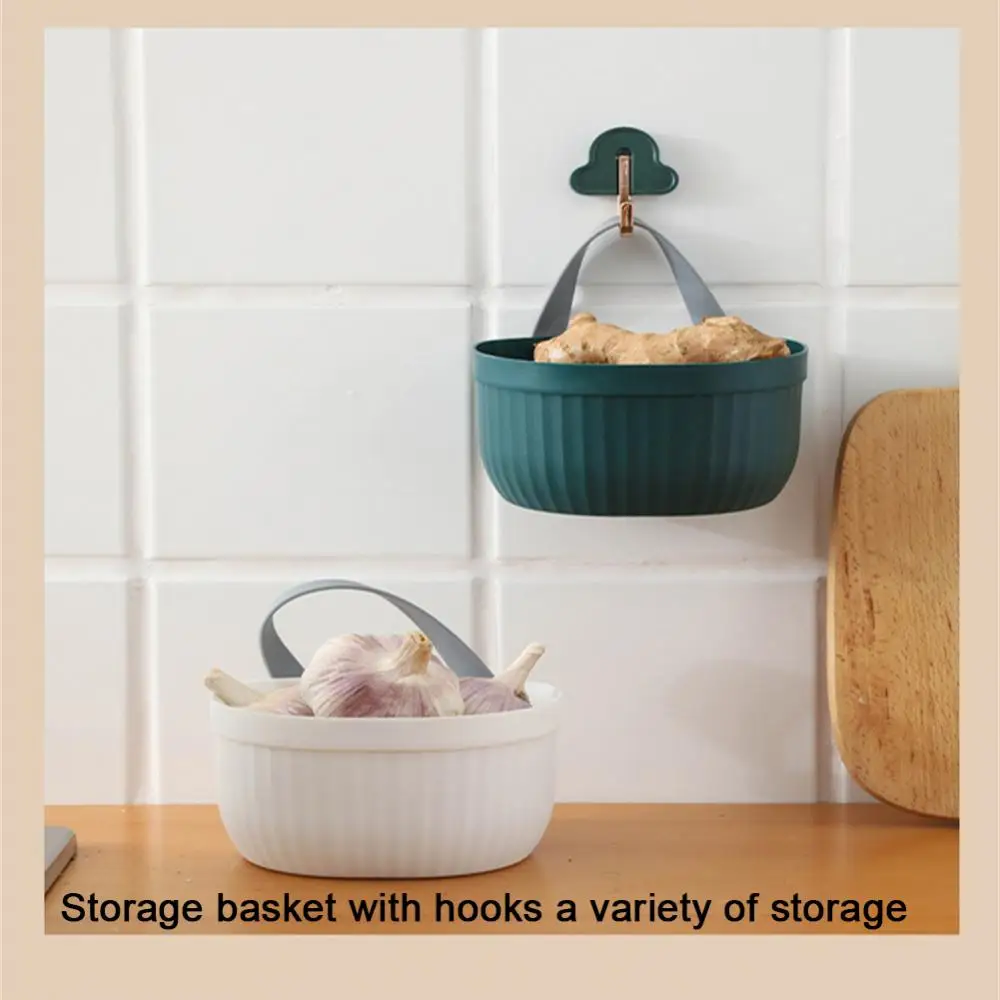 

High Quality Hanging Rack Multifunctional Scallion Ginger And Garlic Storage Basket 2023 Wall Hanging Vegetable Basket Hook Home