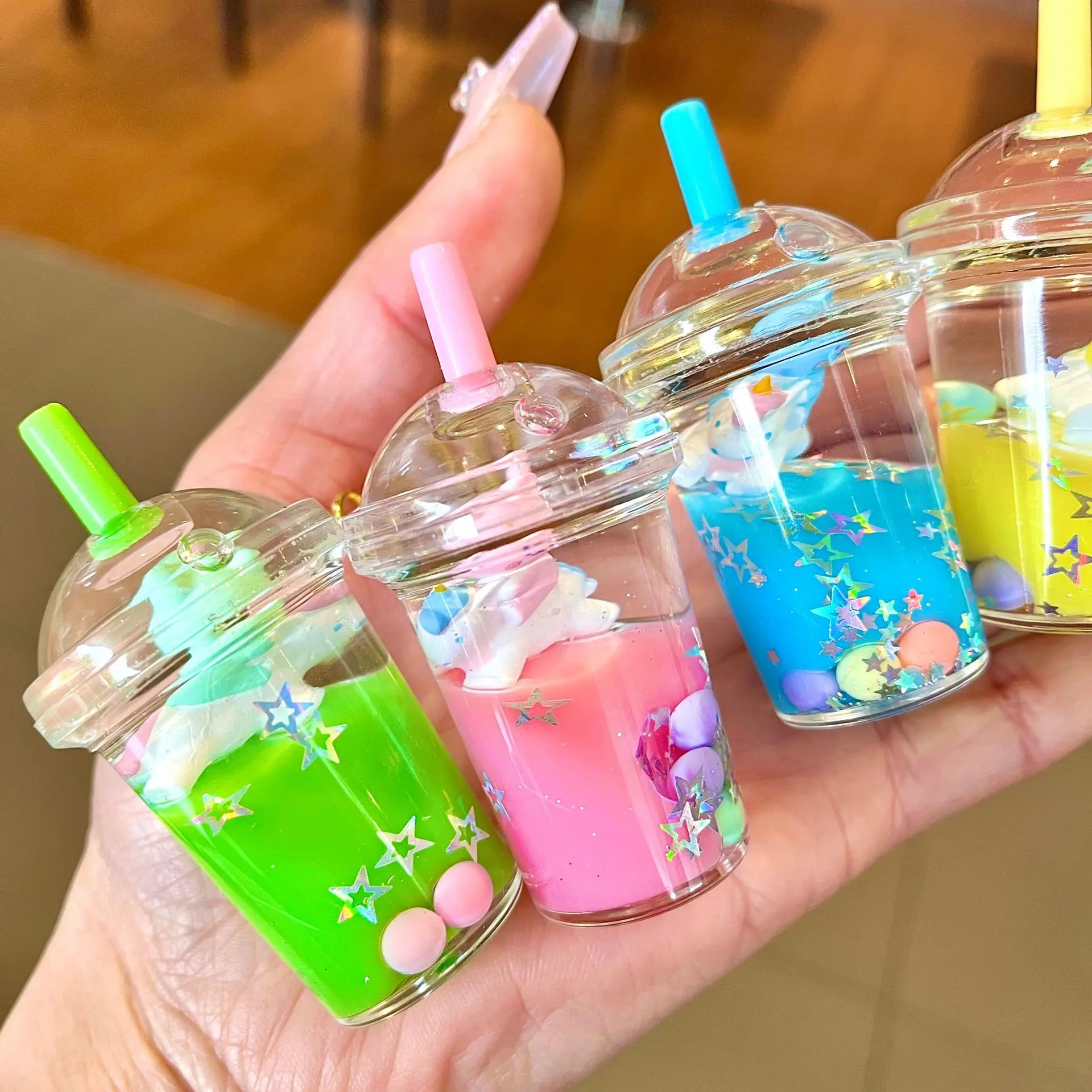

DIY Oil -in -liquid Flowing Sand Bottle Decoration New Creative Drift Gift Acrylic Keychain Wholesale Bag Pendant Accessories