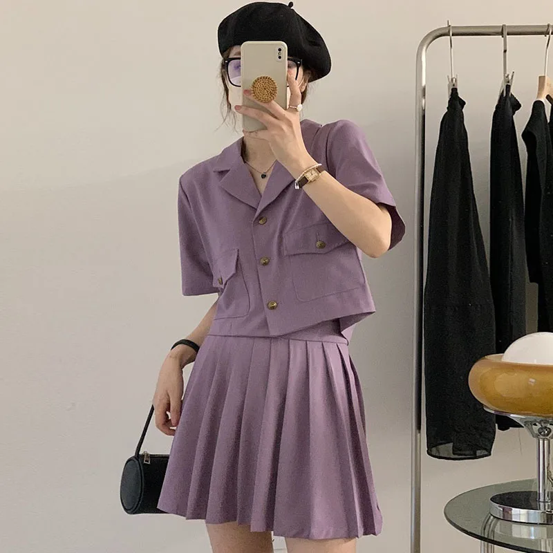 

Женский элегантный костюм Clothland из блузки и юбки, рубашка с коротким рукавом и плиссированная юбка, милый летний комплект из двух предметов ...