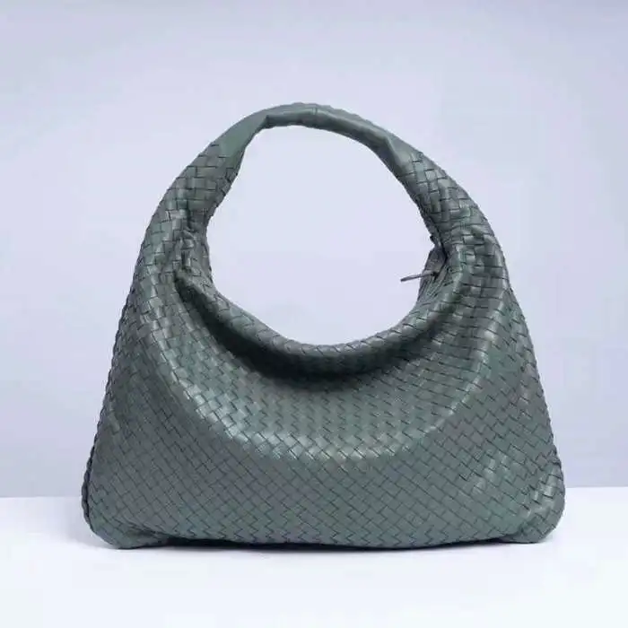 

2022 new fashion hand woven women's Dumpling bag top layer sheepskin European and American leisure portable shoulder bag