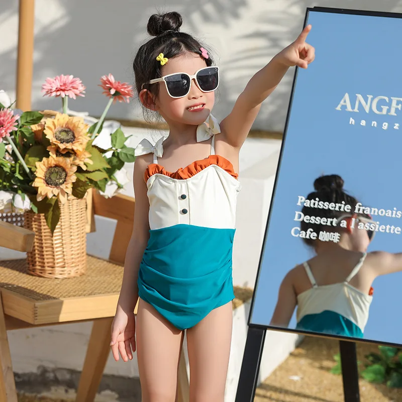 

2022 New Children's Swimsuit Girls Sling Bow One-piece Swimsuit Cute Playful Three-color Beach Swimwear