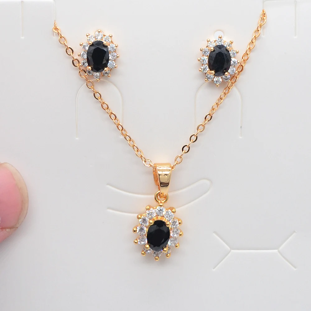 Модные женские серьги-гвоздики золотого цвета с красным кубическим цирконием