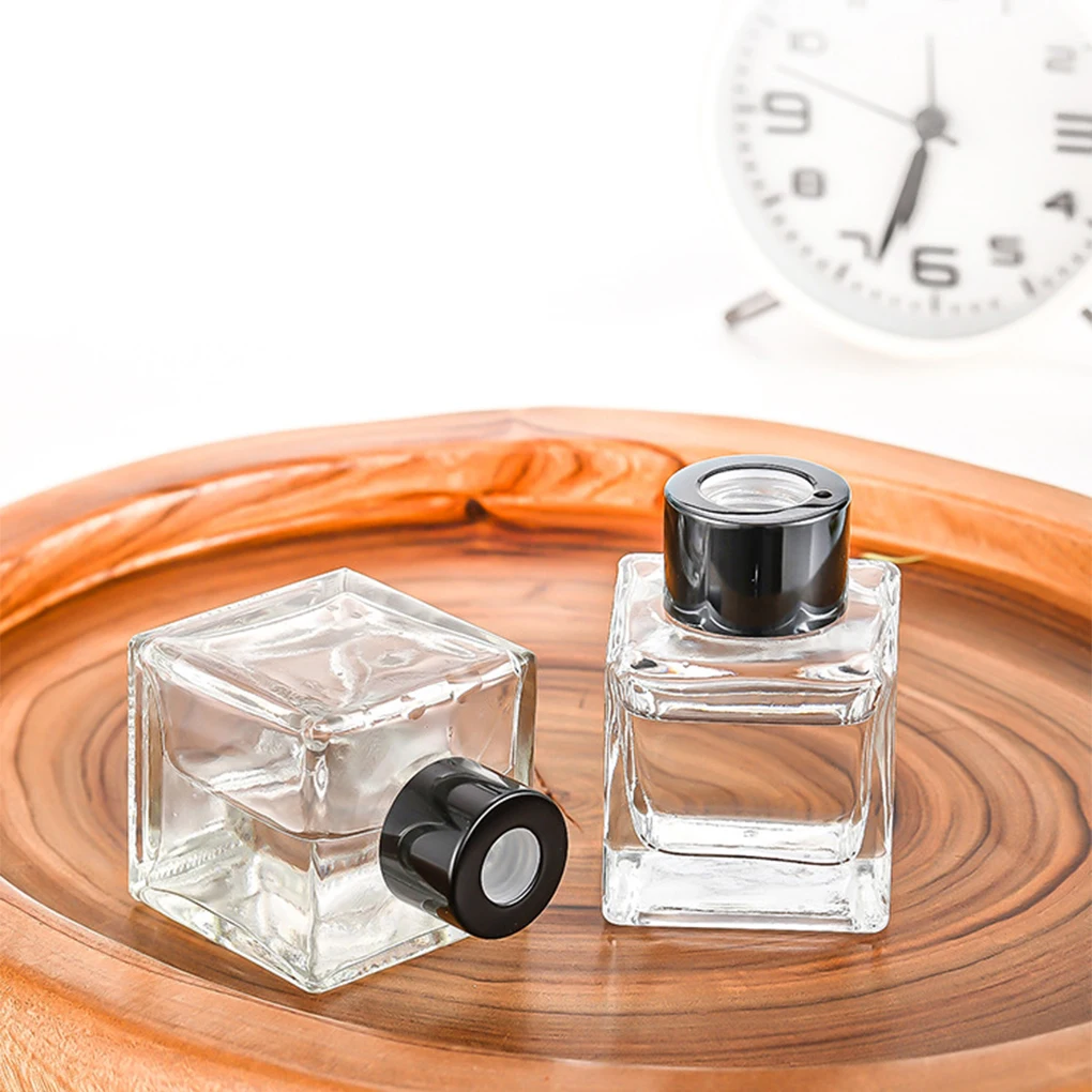 

Fragrance Reed Diffusers - Square Glass With Multiple Color Options And Is Paired Bottle Stopper