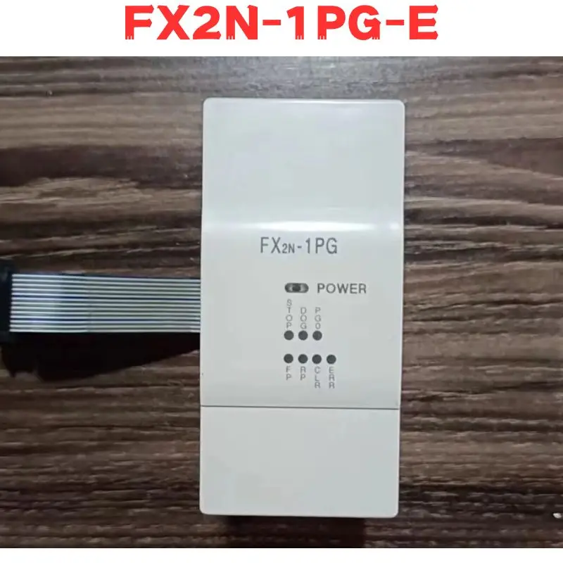 Б/у Φ FX2N-1PG-E FX2N 1PG E модуль протестирован