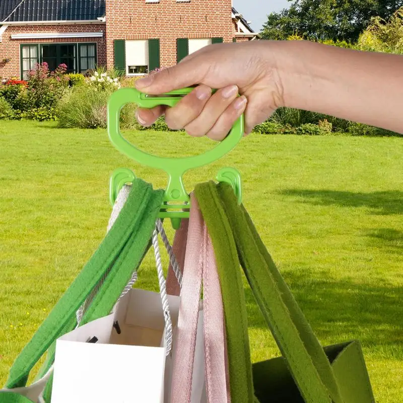 Сверхмощный держатель для продуктовых сумок каждый вмещает до 100 фунтов. Удобная