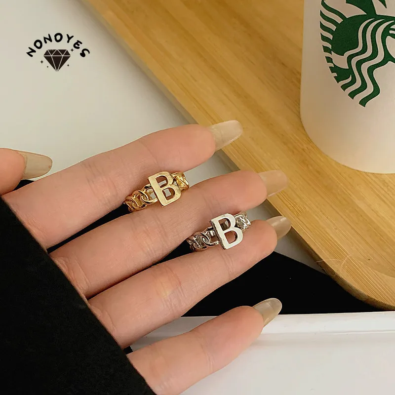 

Nonoyes Fashion Golden Woman's Ring's Unique Lock Chain Punk Letter B Ring Light Luxury Japanese Jewelry Party Gift Wholesale