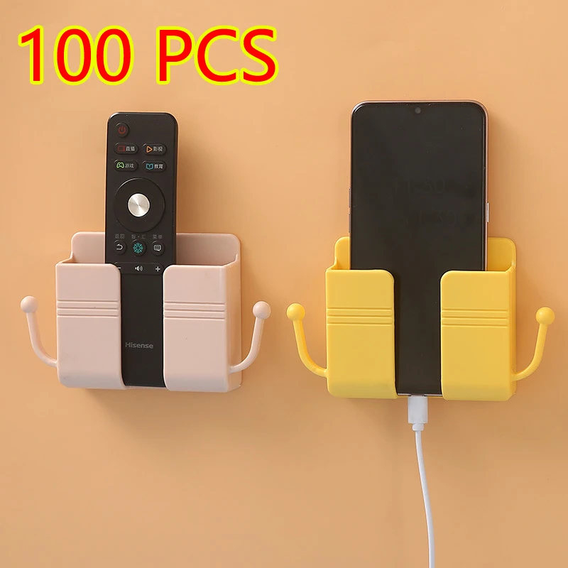 

Wholesale Wall Mounted Remote Control TV Air Conditioning Board Storage Box Mobile Phone Charging Bracket Bedside Storage rack