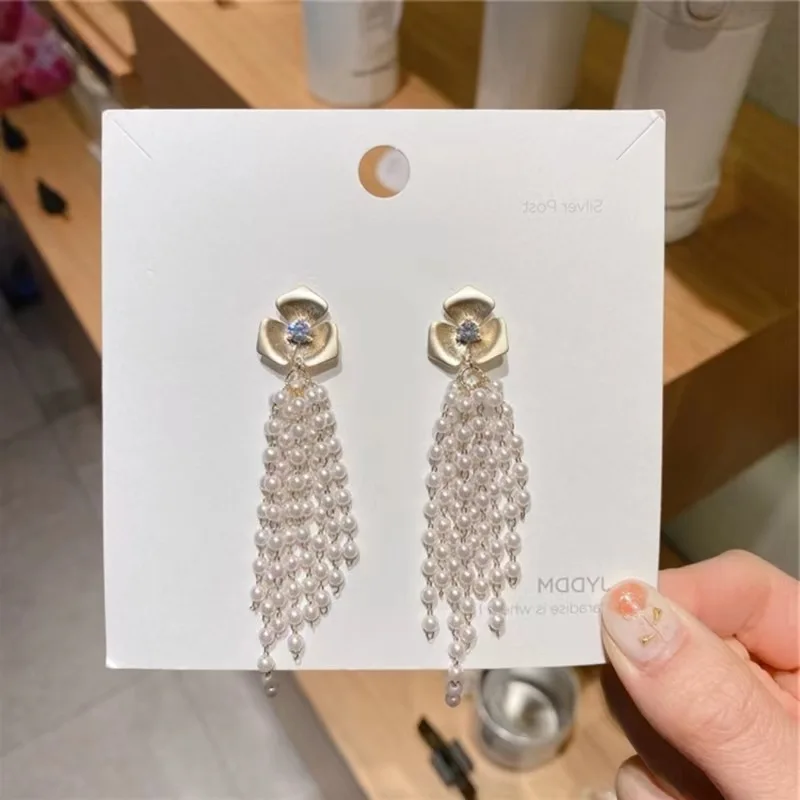 

Korean earrings Pearl earrings drop female high-grade sense earrings temperament light luxury style all match delicate earrings
