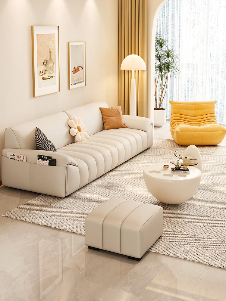 

Стиль: Итальянский минималистичный кожаный диван, кремовый стиль, прямой ряд, маленькая гостиная на три или четыре человека, современный простой диван