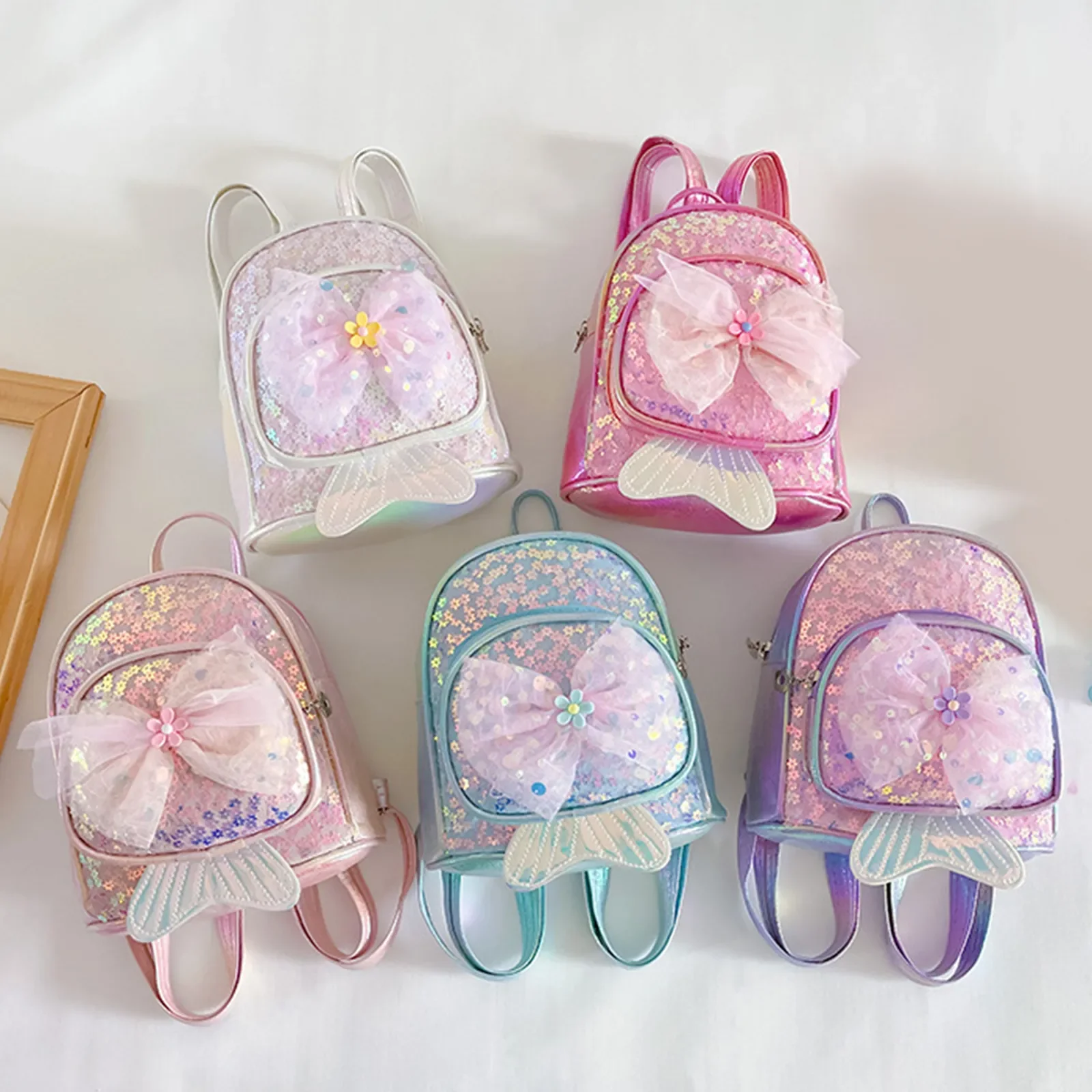 

Женский рюкзак с блестками и бантом «рыбий хвост»