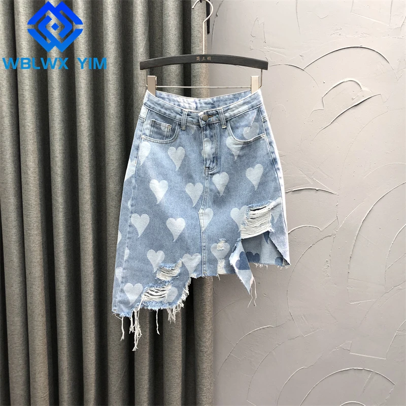 

Summer High Waist Denim Skirt Women Fashion Heart Print Hole Irregular Package Hip Skirts Female Loose A-Line Jeans Skirt 2022
