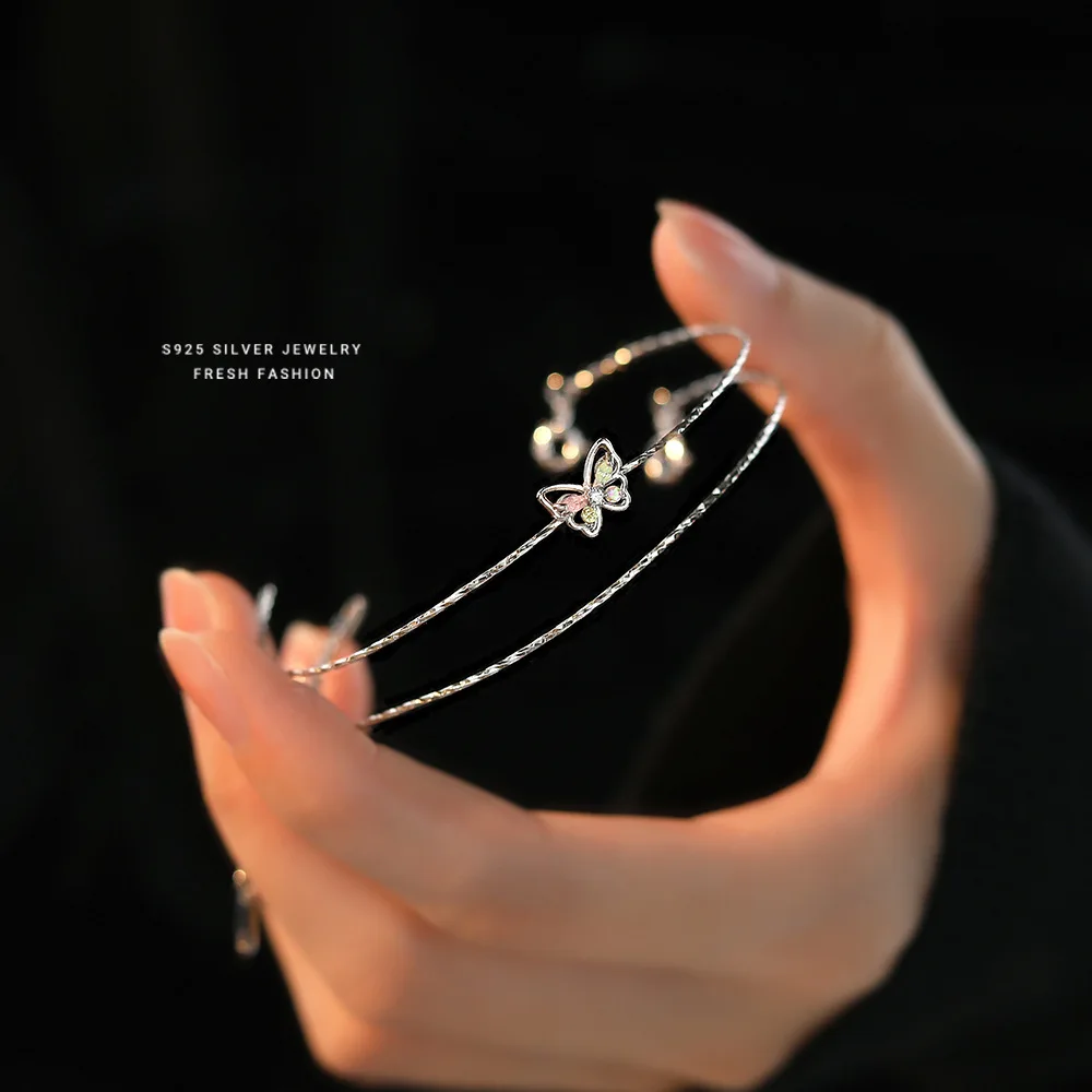 Женский браслет из серебра 925 пробы с разноцветными бабочками циркония