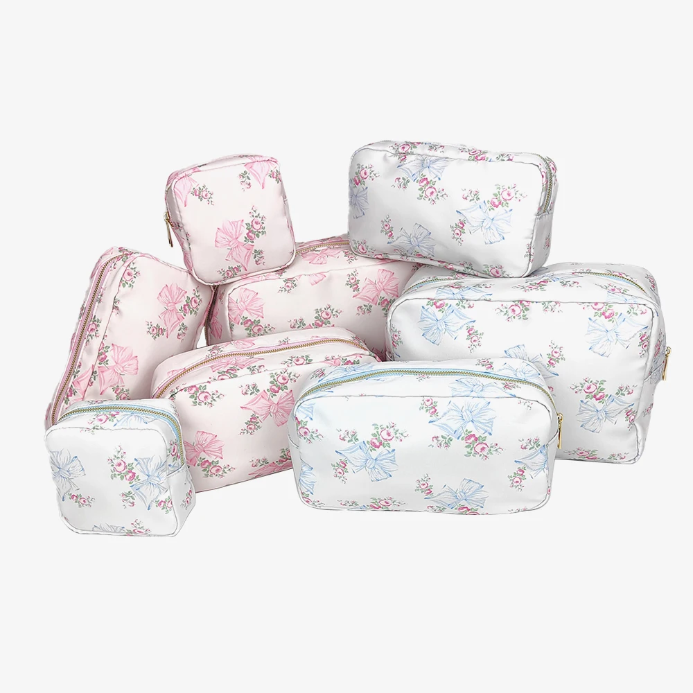 

Fashionable and Beautiful Pink Blue Printed Bow Waterproof Nylon Cosmetic Bag Party Wedding Flower Bag Outgoing Storage Bag