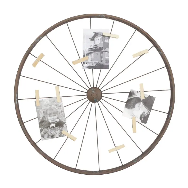 

Brown Metal Wheel Bike Wall Decor with Clothespin Photo