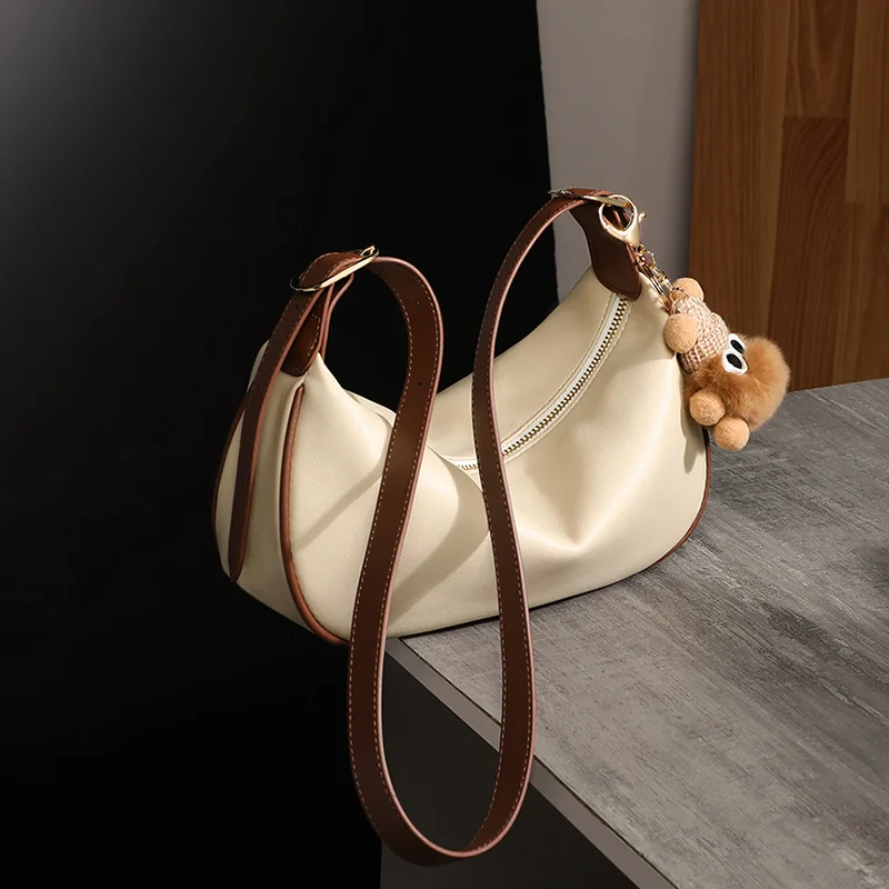 

2023 New Arrival: Women's Summer Crossbody Bag - Versatile, High-quality and Unique Design, Genuine Leather Dumpling Bag