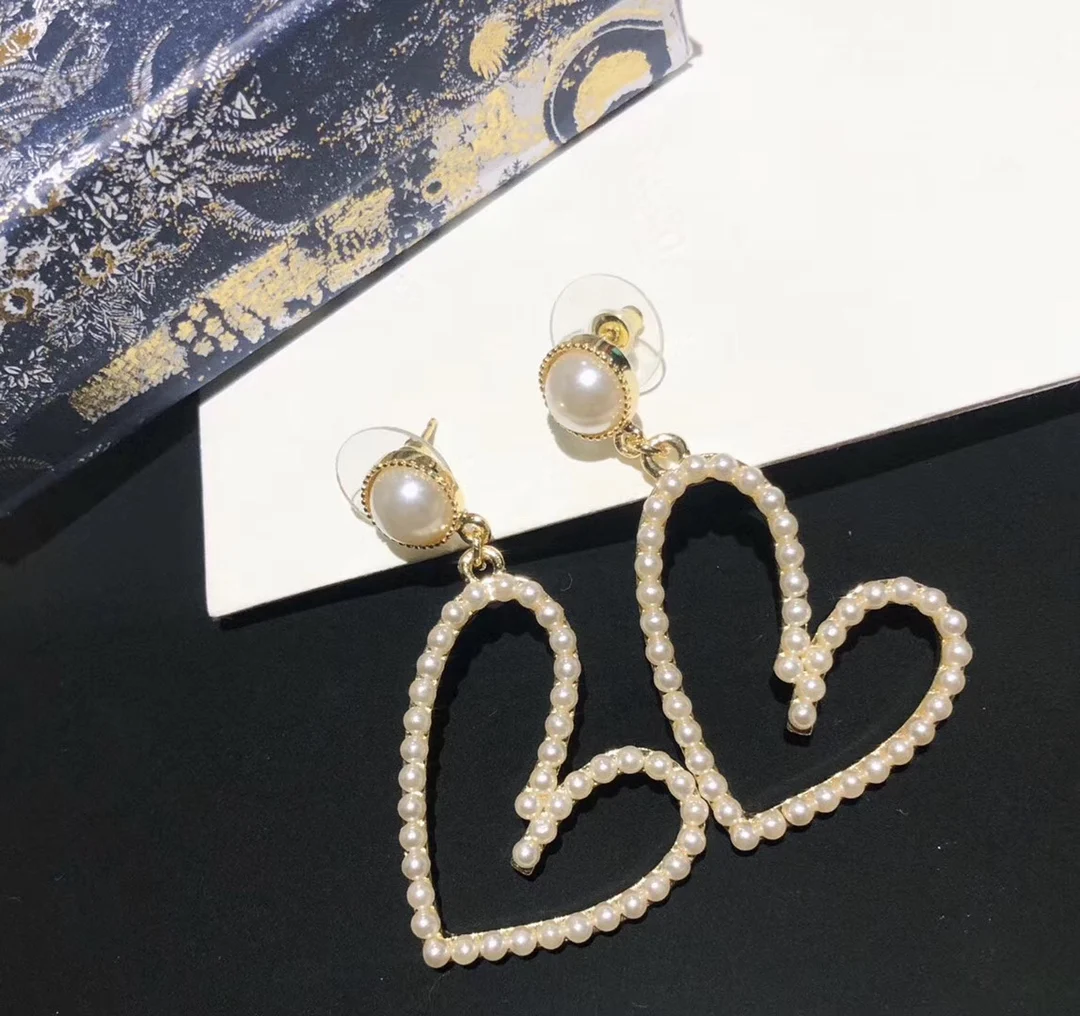 

European and American fashion peach heart love pearl earrings