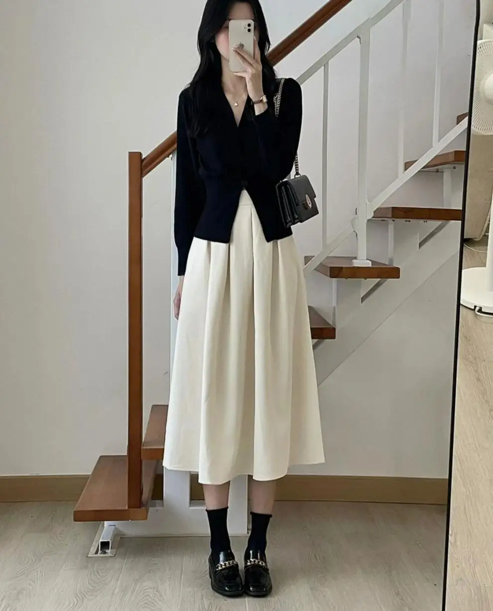 Женский костюм из двух предметов черный комплект с топом и юбкой до локтя во