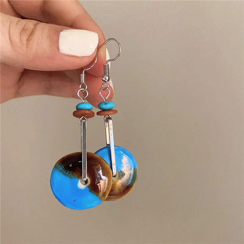 Серьги-гвоздики в европейском и американском стиле с синими камнями