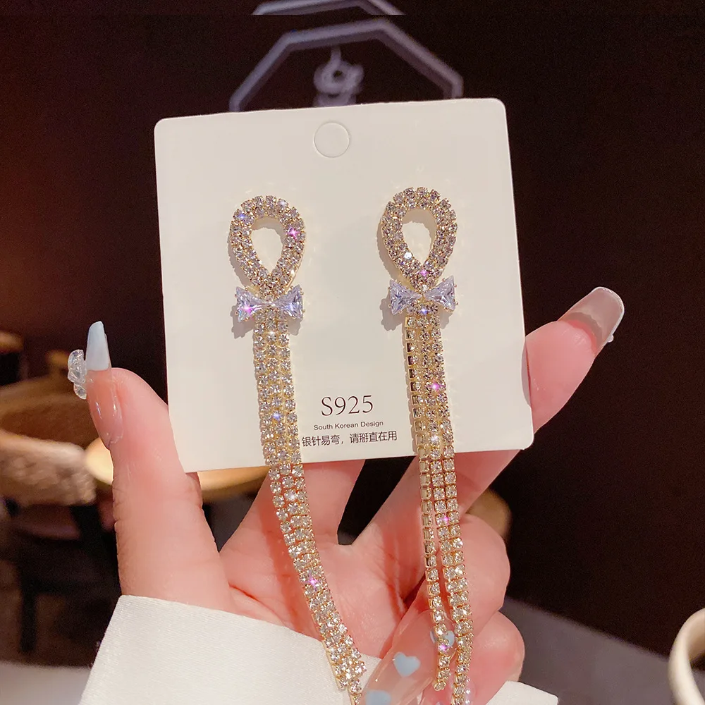 

S925 Silver Needle Hollow Ellipse Bowknot Long Fringe Rhinestone Tassel Earrings Women's Korean Ins Style Ear Studs Ear Jewelry