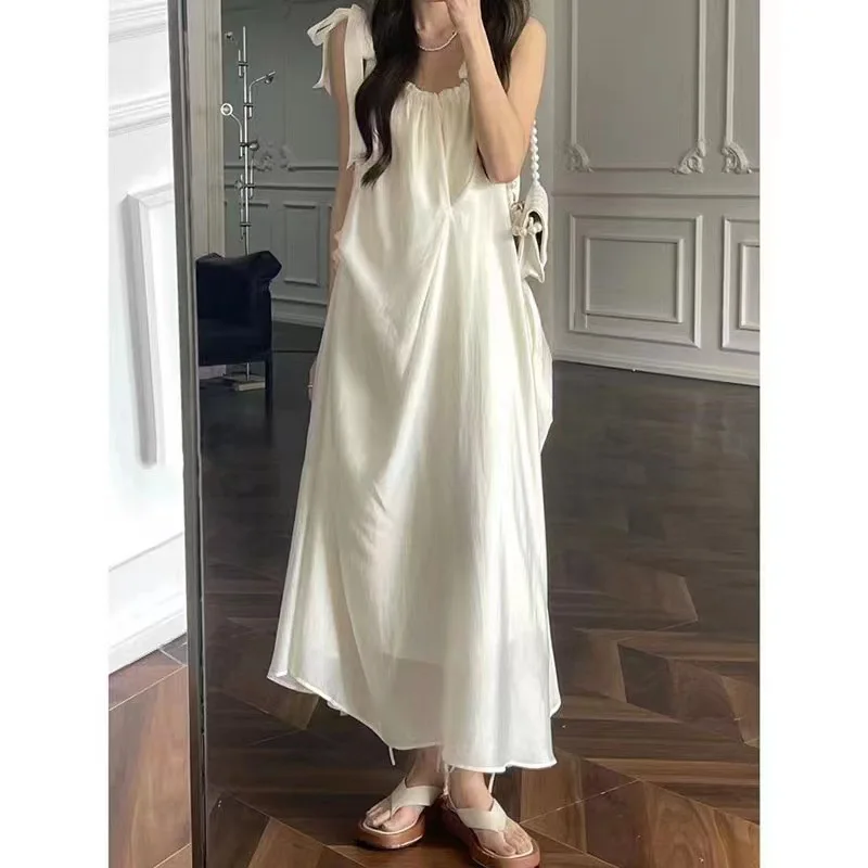 

White suspender dress, women's summer 2023 new French gentle style, temperament, super fairy long skirt