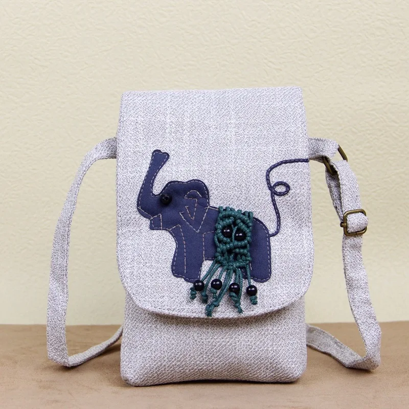 

New Arrival Small women string appliques Classic handbags!Nice animal embossing national shoulder bags All-match canvas Carrier